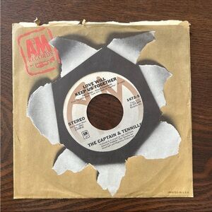 AM Records Vinyl 45rpm 7”- The Captain & Tennille ‘Love Will Keep Us Together’..